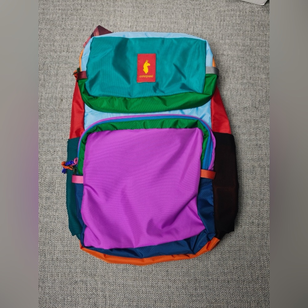cotopaxi Del Dia 16L Multicolor Backpack with Purple Front Pocket